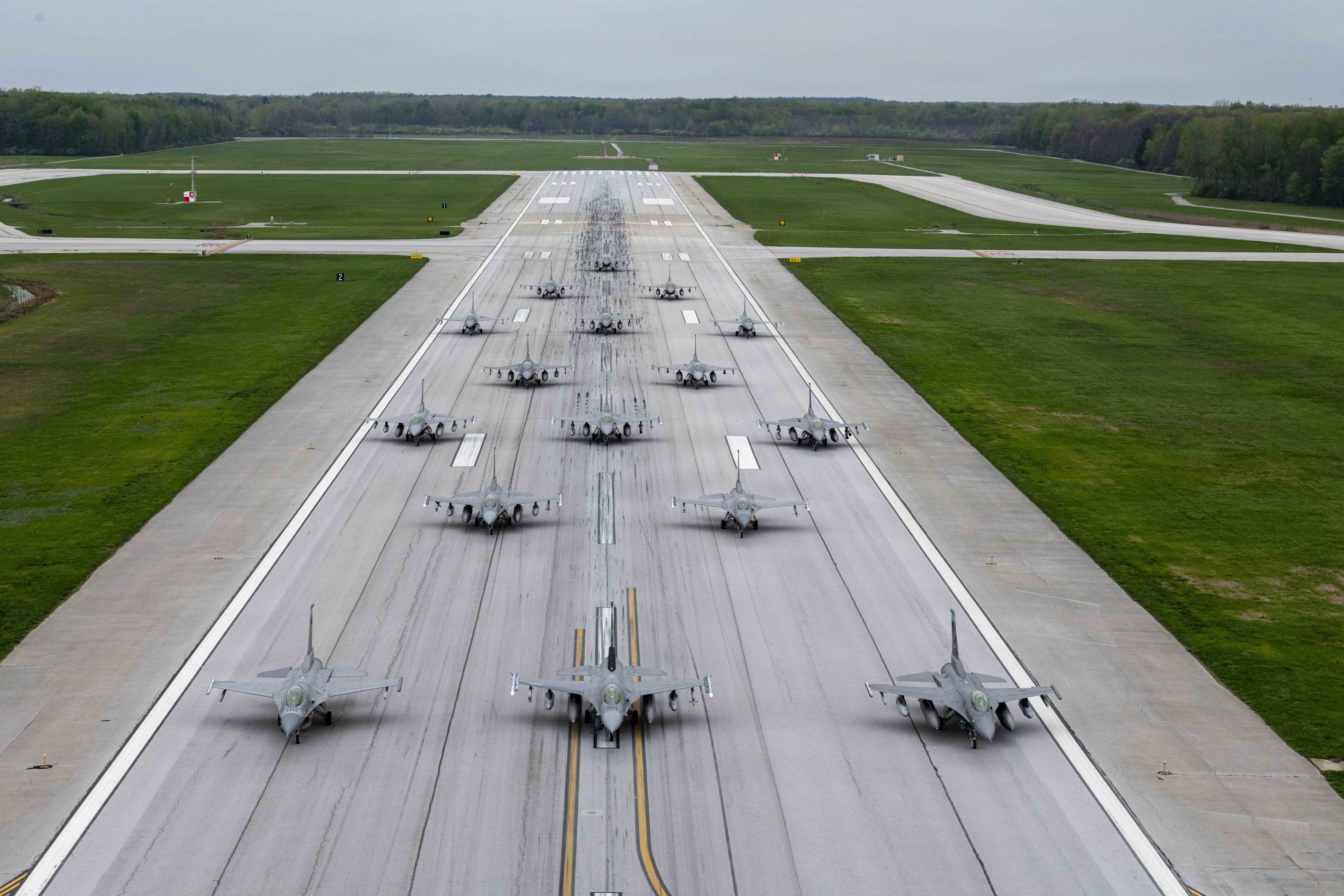 F-16 Fighting Falcons in elephant walk formation demonstrating full fighter fleet readiness