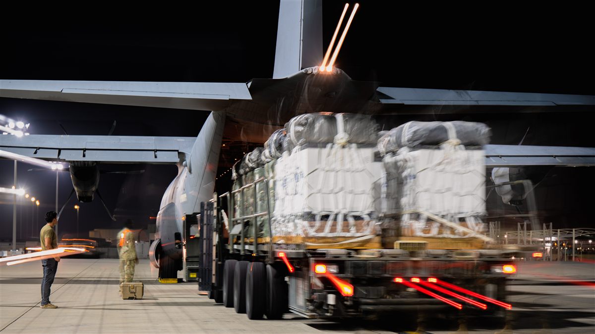 C-17 Globemaster loading humanitarian aid pallets for airlift mission