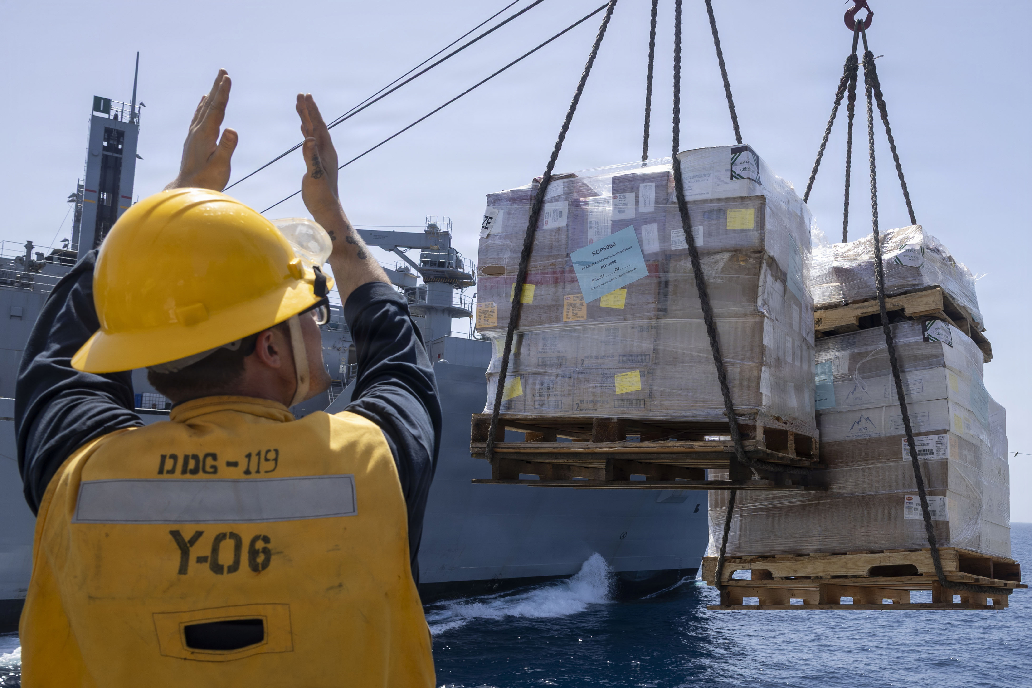 Navy destroyer underway replenishment pallet transfer operations